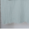 close up of maison table runner in light blue grey colour