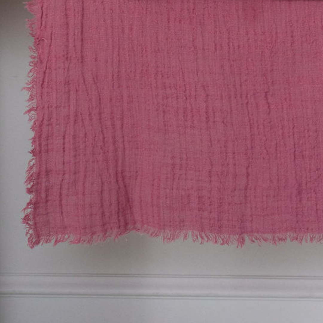 close up of maison table runner in light magenta colour