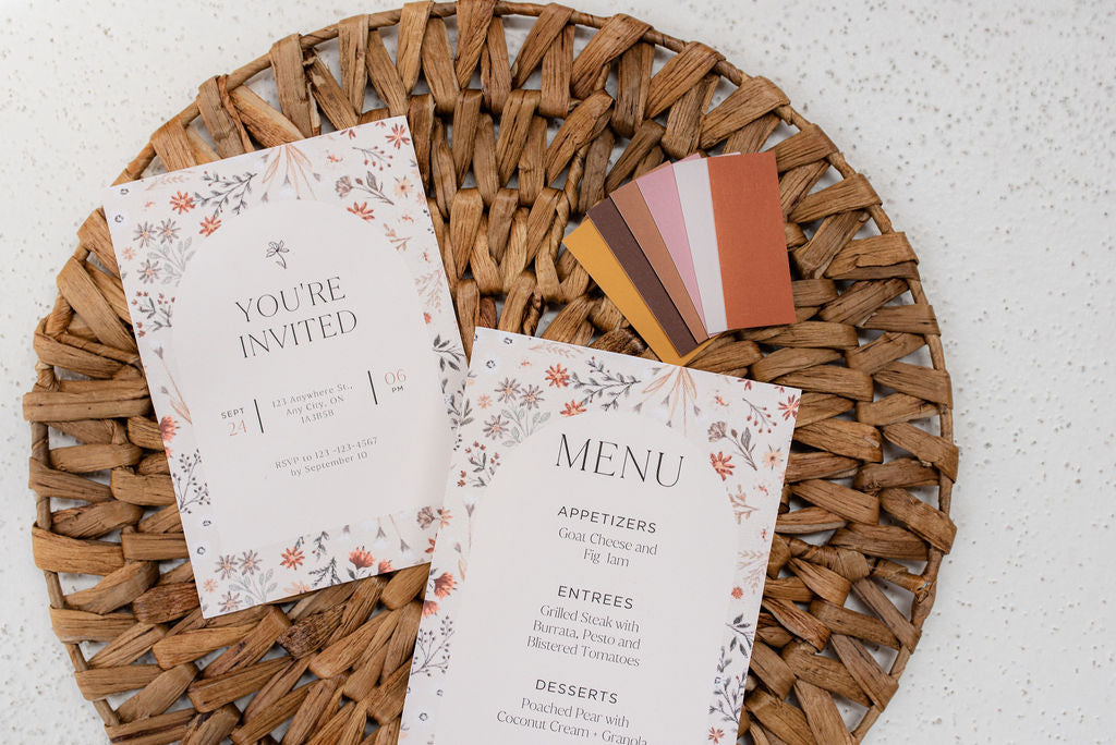 harvest prinatable place card invite and menu templates laying flat on natural woven charger