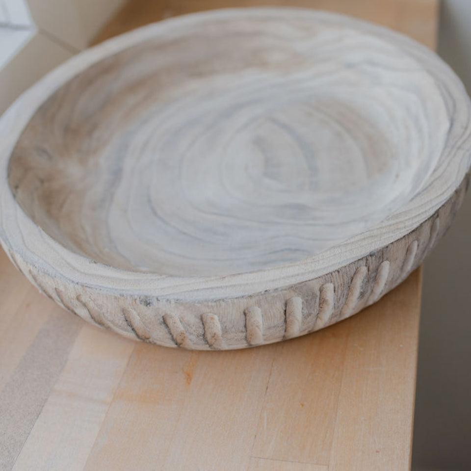 overhead angled close up of escapade white washed wooden bowl